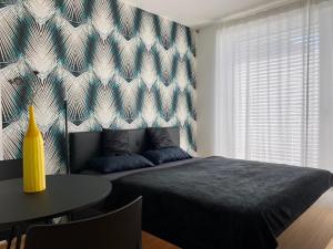 Lova arba lovos apgyvendinimo įstaigoje Business Apartments