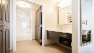 A bathroom at Staybridge Suites West Edmonton, an IHG Hotel