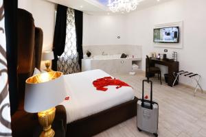 Escape Luxury Suite - CA Domus Collection में एक कमरे में एक या कई बेड