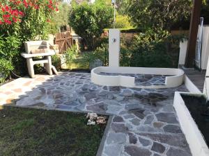 A garden outside villetta san teodoro IUN Q7135