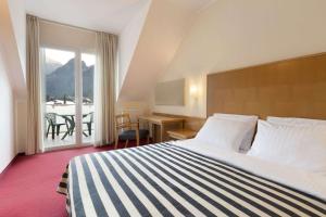 Ramada Hotel & Suites Kranjska Gora 객실 침대