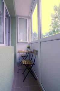 En balkong eller terrasse på Apartamentai Domeva