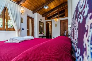 Giường trong phòng chung tại Agriturismo Il Giardino di Vigliano