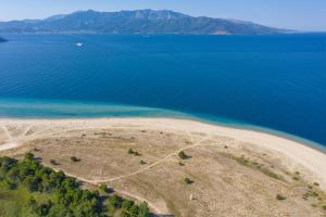 an aerial view of an island in the ocean at Nicole Fresh Apartments in Keramotí