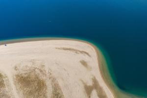 an aerial view of an island in the ocean at Nicole Fresh Apartments in Keramotí