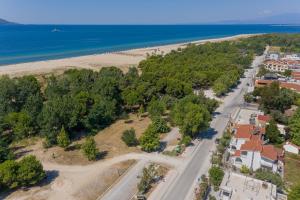 an aerial view of a beach and the ocean at Nicole Fresh Apartments in Keramotí