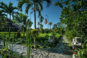 Сад в Bliss Ubud Spa Resort