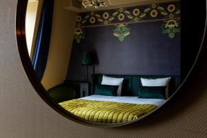 Giường trong phòng chung tại Hotel Aalders