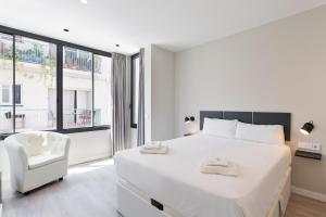 Cama ou camas em um quarto em Sitges Vibe Apartments by Olala Homes