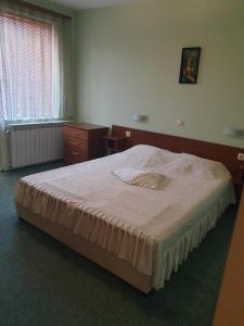 Voodi või voodid majutusasutuse Guesthouse Kiritsovi toas