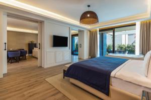 Posteľ alebo postele v izbe v ubytovaní Kaya Palazzo Resort & Residences Le Chic Bodrum