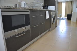 Una cocina o cocineta en Cerca da Vitoria 2 Sesimbra