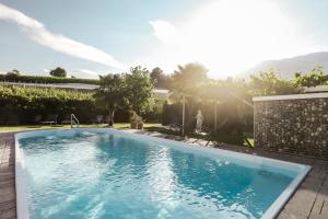 The swimming pool at or close to Lingers Suites & Residence