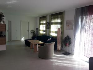 Uma área de estar em APARTMENT Top1, 2 Schlafzimmer 3 Betten BESTROOMS eU