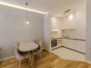 A cozinha ou kitchenette de Apartments Centrale 28