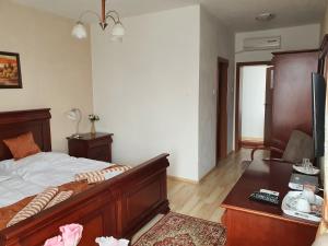 Кровать или кровати в номере Hotel Oko