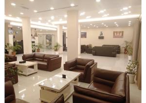 Кът за сядане в Tanuf Residency Hotel