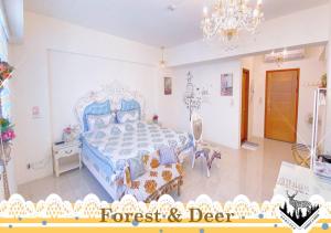 เตียงในห้องที่ Forest Deer Black Tea Homestay