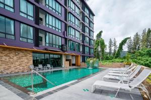 Sundlaugin á CA Hotel and Residence Phuket - SHA Extra Plus eða í nágrenninu