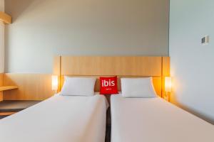 เตียงในห้องที่ ibis Cartagena Marbella