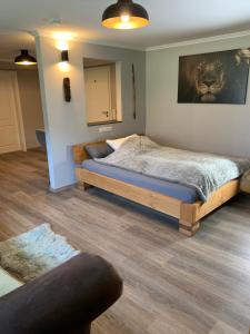 Una cama o camas en una habitación de African Suite - Maintal bei Frankfurt