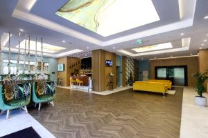 Гостиная зона в GRAND VIEW Hotel & Suites Copou