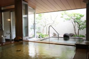 The swimming pool at or close to Uozu Manten Hotel Ekimae