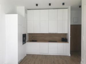 Dapur atau dapur kecil di Mlociny Apartment