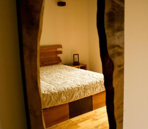 A bed or beds in a room at Quinta de Barbêdo - Turismo Rural