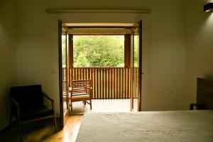 A bed or beds in a room at Quinta de Barbêdo - Turismo Rural