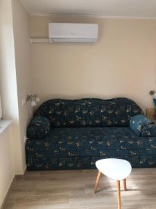 Uma área de estar em Relax Szófia Apartman