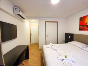 Sjónvarps- og/eða afþreyingartæki á Easy Suites Natal