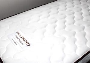 a close up of a white mattress with the word mattress on it at Hotel Trend JR Uji Ekimae in Uji