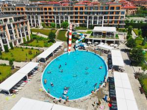 an overhead view of a swimming pool in a resort at Premier Fort Club Hotel - Full Board in Sunny Beach