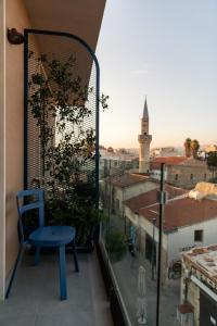 A balcony or terrace at Old Port Hotel