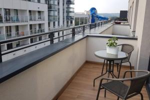 Un balcón o terraza en Nowoczesny apartament przy Aquapark Reda