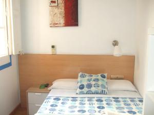 Postelja oz. postelje v sobi nastanitve Hostal Felipe 2