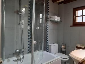 Un baño de Posada El Hidalgo