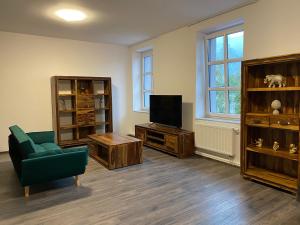 Televisyen dan/atau pusat hiburan di Boutique Apartments Liberec