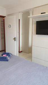 Apartamento Frente Mar TV 또는 엔터테인먼트 센터