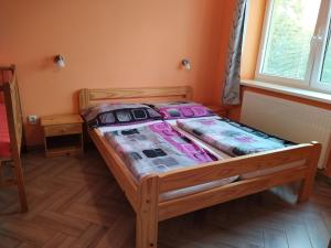 Ліжко або ліжка в номері Apartments Klentnice U Mikulova