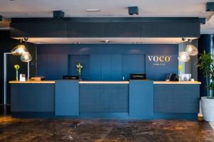 El lobby o recepción de voco® Villach, an IHG Hotel