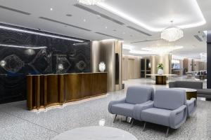 Кът за сядане в Premier Hotel Odesa