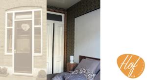 - une chambre avec un lit, une fenêtre et une porte dans l'établissement Hof, a luxury B&B in the center of Eindhoven, à Eindhoven