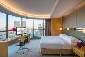 Postelja oz. postelje v sobi nastanitve Ascott Raffles City Beijing