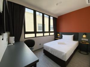 Cama ou camas em um quarto em Woco Hotel Kinrara