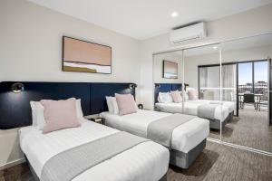 A bed or beds in a room at Quest Preston