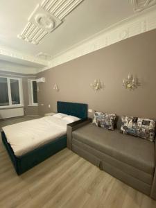 Heart Kyiv Apart-Hotel 객실 침대