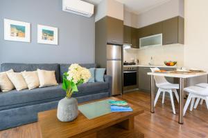 A kitchen or kitchenette at Elounda Colour Apartments