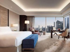 Fairmont Chengdu में एक कमरे में एक या कई बेड